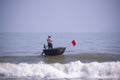 Da Nang, Vietnam, January 16, 2020, Vietnamese fisherman flying inside a round bamboo Royalty Free Stock Photo